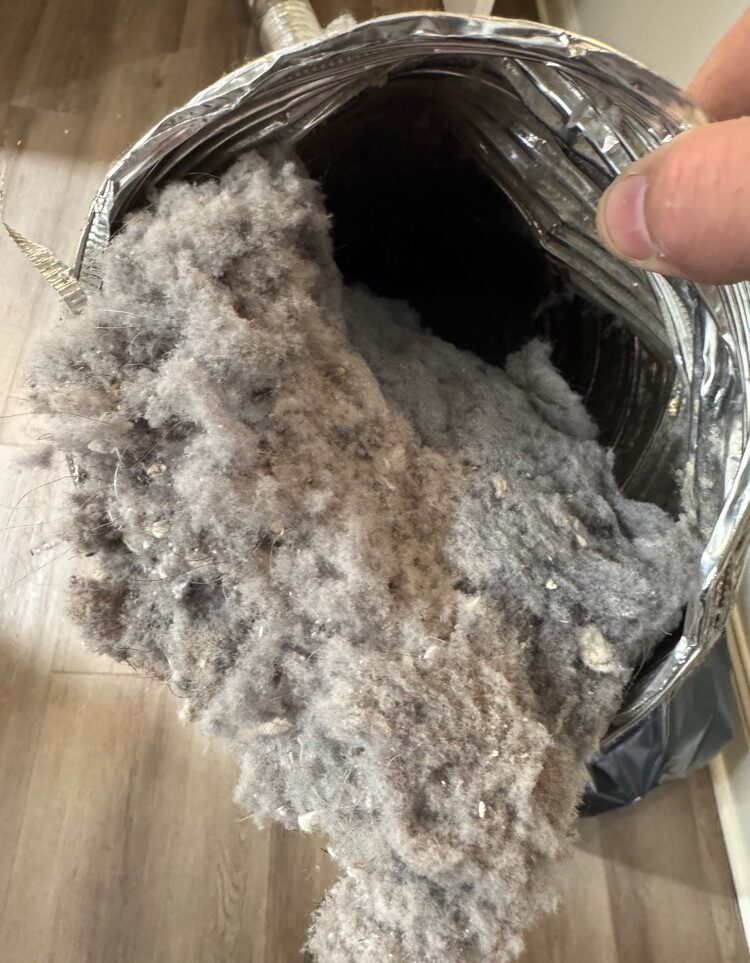 View of a dirty dryer vent interior